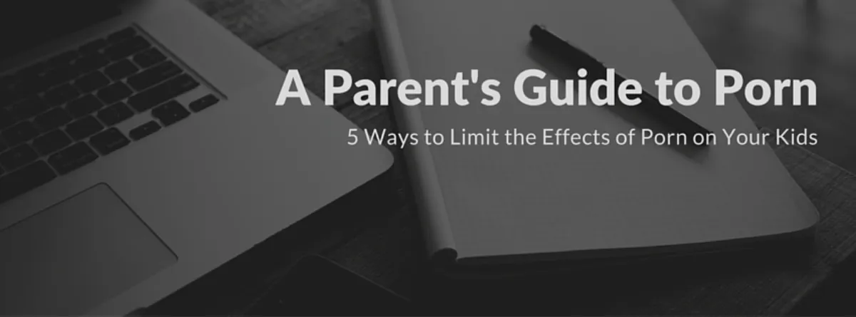 A parent and child sitting together with a device