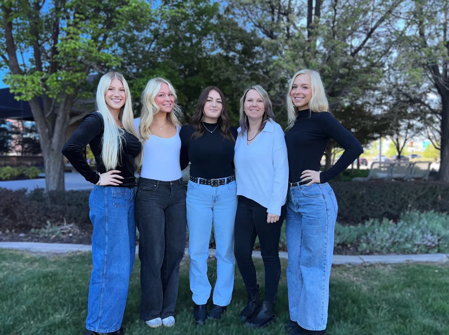 Five Connections Counseling team members standing together outdoors on a sunny day