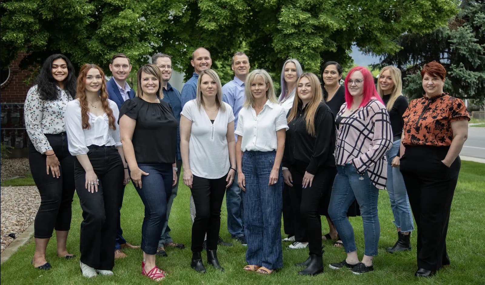 The full Connections Counseling team of clinicians and staff gathered together outdoors